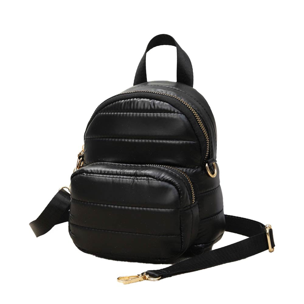Black Solid Puffer Mini Backpack Bag, Great for adding fashionable accents to your daily style. This mini bag offers enough room for your daily going essentials. It can hold your wallets, keys, cell phones, makeup and other small accessories and stuff. Mini size and lovely decoration make your look chic and fashionable. These beautiful and trendy backpacks have adjustable hand straps that make your life more comfortable.