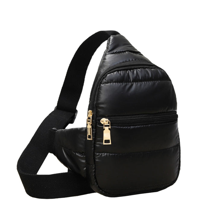 Black Solid Puffer Mini Sling Bag, be the ultimate fashionista while carrying this Solid Puffer Sling bag in style. It's great for carrying small and handy things. Keep your keys handy & ready for opening doors as soon as you arrive. The adjustable lightweight features room to carry what you need for long walks or trips.