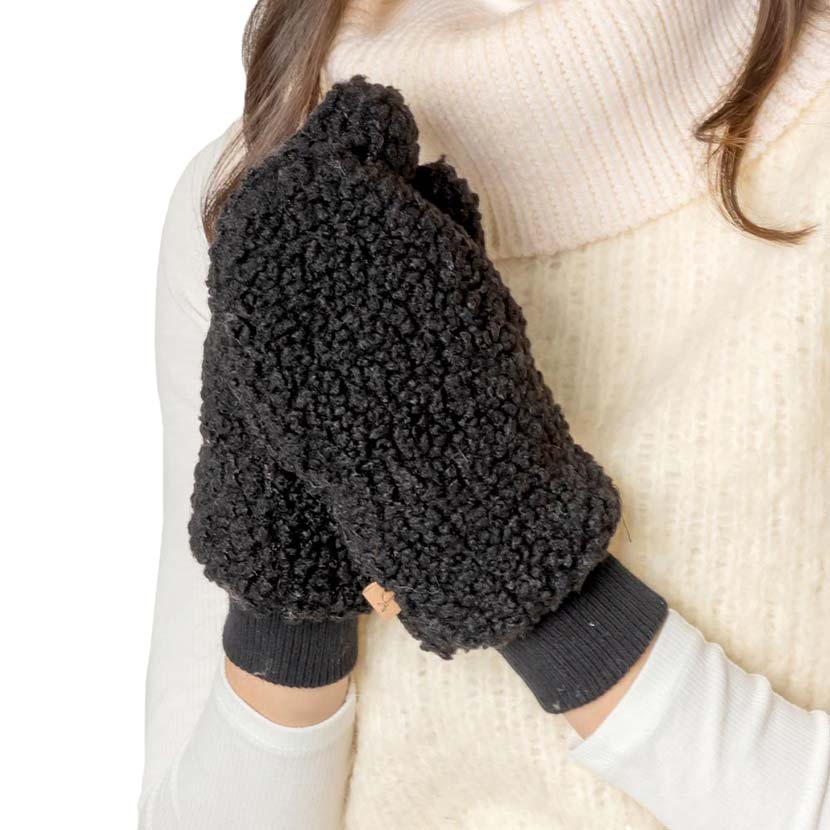 Black Solid Sherpa Mitten Gloves, are warm, cozy, and beautiful mittens that will protect you from the cold weather while you're outside and amp your beauty up in perfect style. It's a comfortable, soft brushed poly stretch knit that will keep you perfectly warm and toasty. It's finished with a hint of stretch for comfort and flexibility. Wear gloves or a cover-up as a mitten to make your outfit gorgeous with luxe and comfortability.