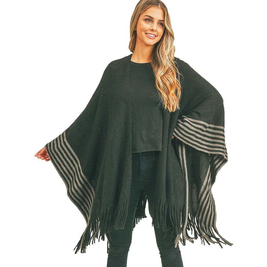 Black Stripe Pattern Bottom Ruana, amps up your beauty with confidence with this beautiful bottom poncho. You can stand out with the contrast of different outfits. Snowflake patterned with beautiful design gives a unique decorative and fashionable look that makes your day with beautiful moments. Match perfectly with jeans and T-shirts or a vest. A perfect eye-catcher and will become one of your favorite accessories quickly.