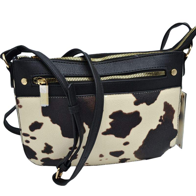 Black Stylish Cowprint Pattern Crossbody Handbag, This Cowprint handbag can be worn crossbody or on the shoulder comfortably. This comfortable handbag is made of high-quality durable PU leather which is also beautiful at the same time. This handbag features one big compartment for your daily essentials and a little more. Show your trendy choice and smartness with this awesome cow-print bag. 