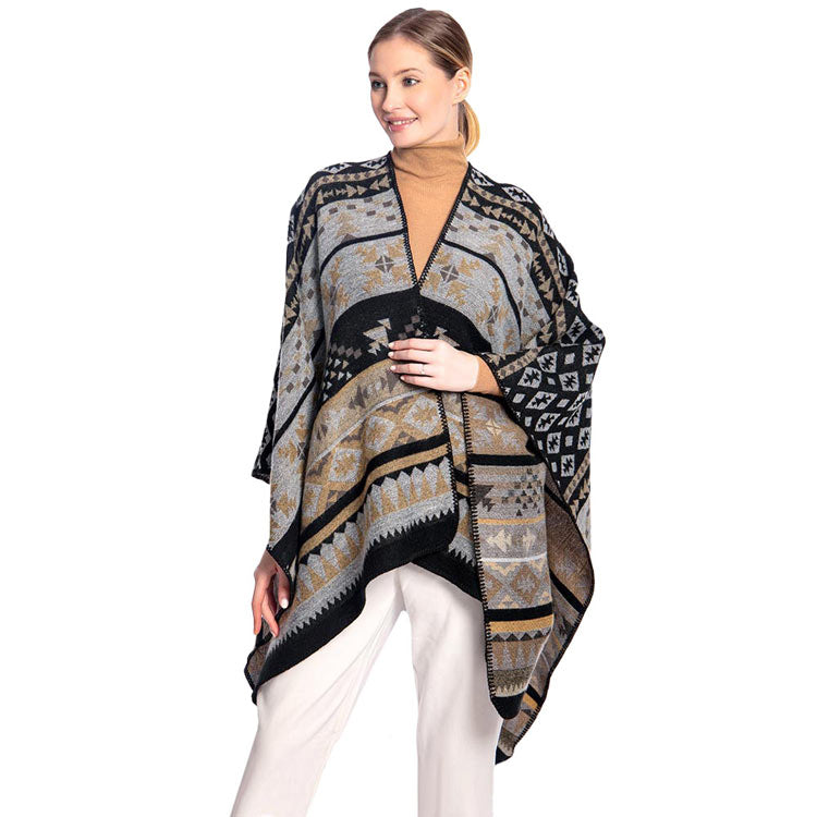 Black Tribal Patterned Poncho, is attractively designed with tribal pattern that will surely amp up your beauty to make you stand out.  It will keep you perfectly warm and toasty everywhere saving you from cold and chill on the outside. It goes with every winter outfit and gives you a unique yet beautiful outlook everywhere. It ensures your upper body keeps perfectly toasty when the temperatures drop.