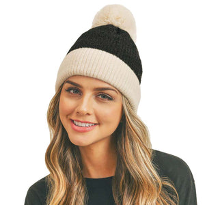 Black Two Tone Knit Pompom Beanie Hat, wear this beautiful pompom Beanie Hat before running out the door into the cool air. It will keep you incredibly warm and toasty on cold days and winter. Accessorize the fun way with this beanie hat to not only get the warmth but also get compliments due to its eye-catchy look. It's the autumnal touch that you need to finish your outfit in style. Beautiful winter gift accessory!