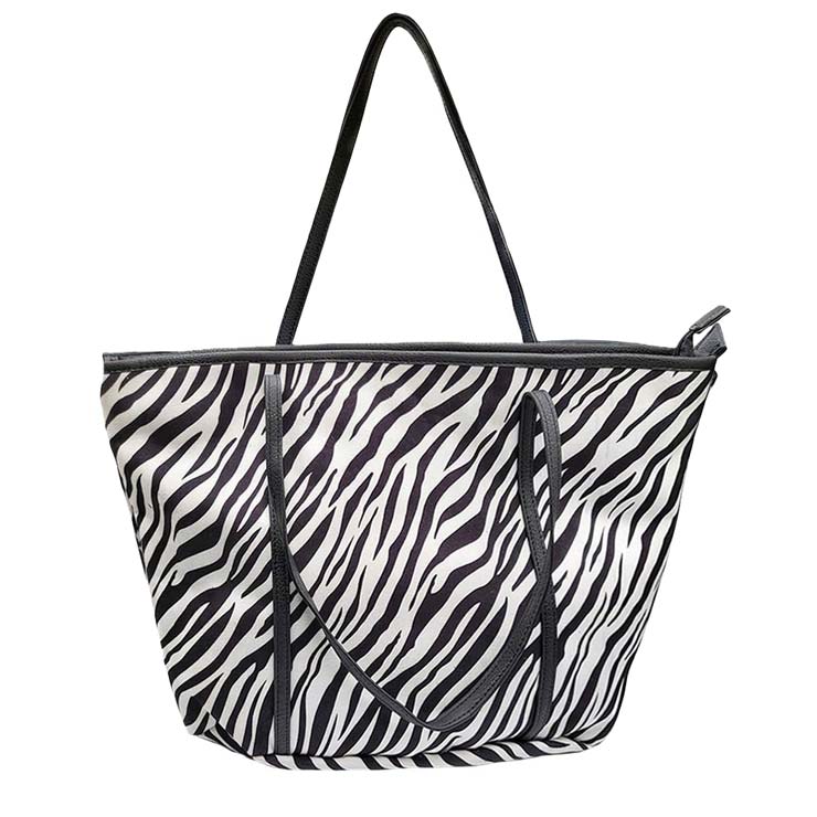 Black Zebra Patterned Shoulder Bag, Look like the ultimate fashionista with this beautiful Zebra patterned shoulder bag. Add something special to your outfit and make you stand out from the crowd. This fashionable bag will be your new favorite accessory. Keep all of your necessary items altogether in this smart shoulder bag. Perfect Birthday Gift, Anniversary Gift, Mother's Day Gift, Graduation Gift, or Valentine's Day Gift. Stay comfortable!
