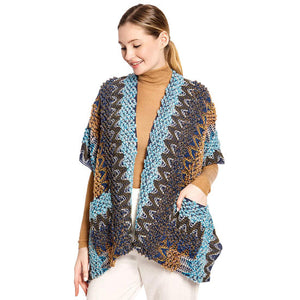 Blue Boho Patterned Front Pocket Ruana,  is the perfect accessory to represent your beauty with comfortability.This boho patterned front pocket ruana isa sophisticated, flattering, and cozy poncho drapes beautifully for a relaxed, pulled-together look. A perfect gift accessory for your friends, family, and nearest and dearest ones. 