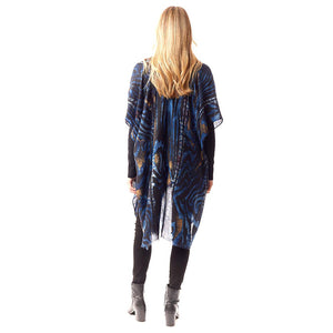 Blue Mixed Animal Printed Gold Foil Accented Ruana Poncho, on-trend & fabulous design make it eye-catching and beautiful. It will keep you cozy and comfortable on winter and cold days. Go outside with confidence and beauty with this animal-designed ponchos. It's a luxe addition to any cold-weather ensemble. Great for daily wear in the cold winter to protect you against the chill.
