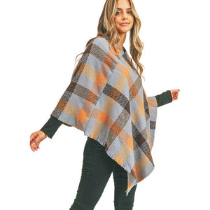 Blue Multi Color Checker Poncho, ensure your upper body stays perfectly toasty when the temperatures drop, timelessly beautiful, gently nestles around the neck and feels exceptionally comfortable to wear this multi color checker poncho. A fashionable eye catcher, will quickly become one of your favorite accessories, warm and goes with all your winter outfits.