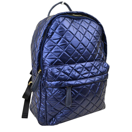 Blue Women's Performance Twill Campus Quilted Backpack. This weather-friendly, water-repellent fabric is durable & lightweight for everyday use. Keep your tech essentials safe with 2 interior mesh slip pockets that work as laptop or tablet compartments for work or school, add in the zippered top closure & fully printed cotton lining & you're ready to conquer the day. 