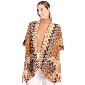 Brown Boho Patterned Front Pocket Ruana,  is the perfect accessory to represent your beauty with comfortability.This boho patterned front pocket ruana isa sophisticated, flattering, and cozy poncho drapes beautifully for a relaxed, pulled-together look. A perfect gift accessory for your friends, family, and nearest and dearest ones. 
