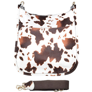 Brown Cattle Patterned Faux Leather Crossbody Bag. These animal themed crossbody bag is uniquely detailed, featuring a bright giving this bag that sophisticated look. This gorgeous bag is going to be your absolute favorite new purchase! It features with adjustable and detachable handle strap, upper zipper closure. Ideal for keeping your money, bank cards, lipstick, and other small essentials in one place.
