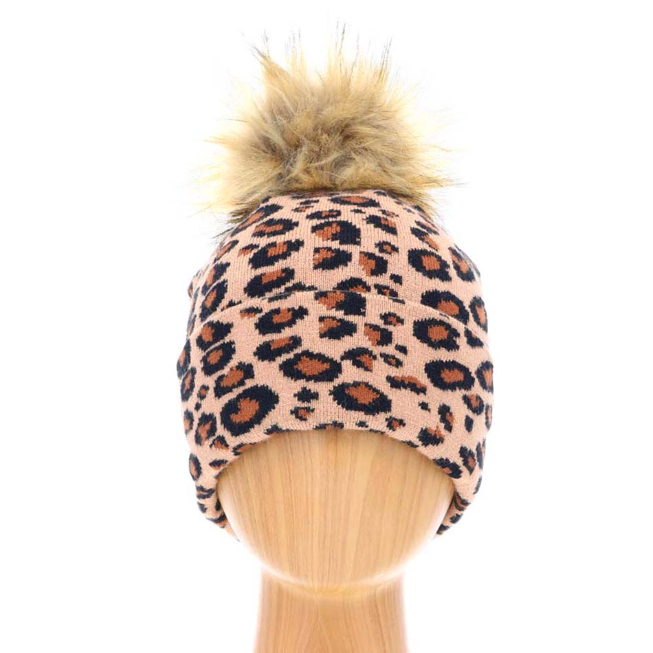 Brown Cheetah Print Double Layered Pom Pom Beanie Hat, Before running out the door into the cool air, you’ll want to reach for this pom pom beanie to keep you incredibly warm. Whenever you wear this beanie hat, you'll look like the ultimate fashionista. Accessorize the fun way with this Cheetah Print pom pom hat, it's the autumnal touch you need to finish your outfit in style.