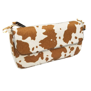 Brown Cow Patterned Faux Leather Shoulder Crossbody Bag. This high quality animal themed shoulder Crossbody Bag is both unique and stylish. perfect for money, credit cards, keys or coins and many more things, light and gorgeous. perfectly lightweight to carry around all day. Perfect for grab and go errands, keep your keys handy & ready for opening doors as soon as you arrive. Versatile enough for wearing straight through the week. 