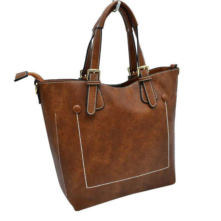 Brown Genuine Leather Tote Shoulder Handbags For Women. Ideal for everyday occasions such as work, school, shopping, etc. Made of high quality leather material that's light weight and comfortable to carry. Spacious main compartment with magnetic snap closure to safely store a variety of personal items such as wallet, tablet, phone, books, and other essentials. One interior open pocket for small accessories within hand's reach.