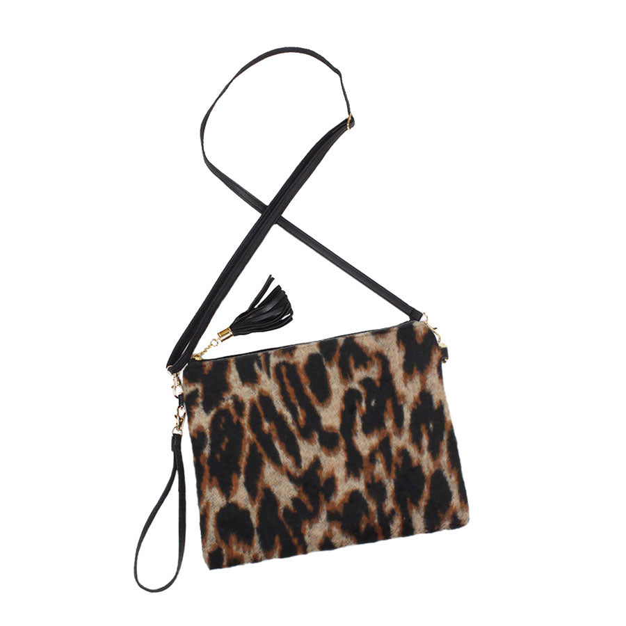Brown Leopard Patterned Crossbody Clutch Bag. Be the ultimate fashionista carrying this trendy crossbody clutch bag! great for when you need something small to carry or drop in your bag. perfect for the festive season, embrace the animal themed spirit with these bag, these pretty  gift Crossbody Bags are sure to bring a smile to your face.