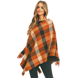 Brown Multi Color Checker Poncho, ensure your upper body stays perfectly toasty when the temperatures drop, timelessly beautiful, gently nestles around the neck and feels exceptionally comfortable to wear this multi color checker poncho. A fashionable eye catcher, will quickly become one of your favorite accessories, warm and goes with all your winter outfits.