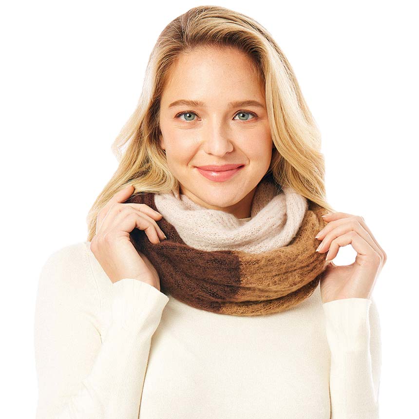 Brown Multi Color Infinity Scarf, is on trend and a beautiful scarf that amps up your beauty with comfort to a greater extent. Great to wear daily in the cold winter to protect you against the chill. It accents the glamour with a plush material that feels amazing and snuggled up against your cheeks. This scarf is a versatile choice that can be worn in many ways. 