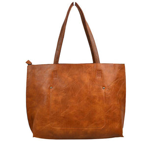 Brown Thea Soft PU Vegan Leather 2 in 1 Tote Crossbody Handbag with Detachable Wristler Coin Purse, Best Seller Tote, Handbag has plenty of room to fit all your items, available in a few colors. Handbag also comes with a removable insert bag that doubles as lining to the bag, or can be removed and worn as a crossbody bag. This 2 in 1 tote bag is just what the boss lady needs!