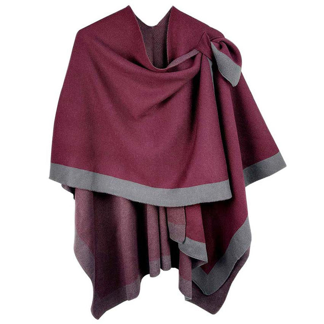 Burgundy Bordered Ruana With Shoulder Strap, is beautifully designed with a border and shoulder strap that will absolutely accent your outlook to a greater extent and keeps you warm and comfortable on cold days. The shoulder strap is so unique and attractive that will surely make you stand out with a unique yet trendy style. It will keep you perfectly warm and toasty everywhere saving you from cold and chill on the outside.