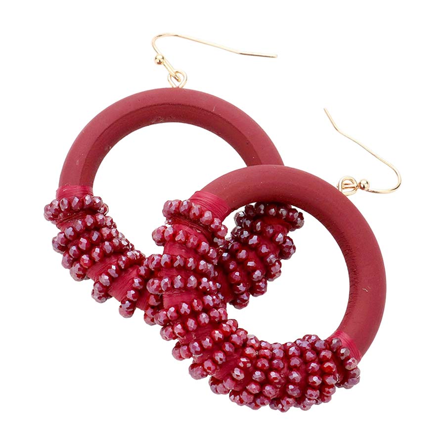 Burgundy Faceted Bead Wrapped Open Wood Circle Dangle Earrings, Put on a pop of color to complete your ensemble in perfect style with these gorgeous bead-wrapped wood circle earrings. The beautifully crafted design adds a gorgeous glow to any outfit with these wrapped wood circle earrings. Perfect for adding just the right amount of shimmer & shine on any occasion.