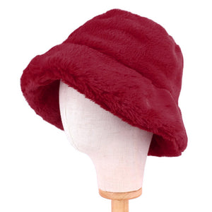 Burgundy Faux Fur Bucket Hat, stay warm and cozy, protect yourself from the cold, this most recognizable look with remarkable bold, soft & chic bucket hat, features a rounded design with a short brim. The hat is foldable, great for daytime. Perfect Gift for cold weather!