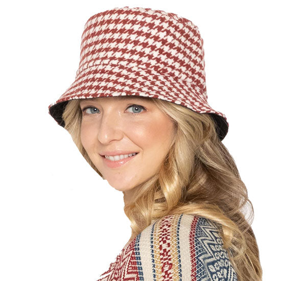 Burgundy Polyester Houndstooth Patterned Bucket Hat, this bucket hat doubles as a rain hat and is snug on the head and stays on well. It will work well to keep the rain off the head and out of the eyes and also the back of the neck. Wear it to lend a modern liveliness above a raincoat on trans-seasonal days in the city.