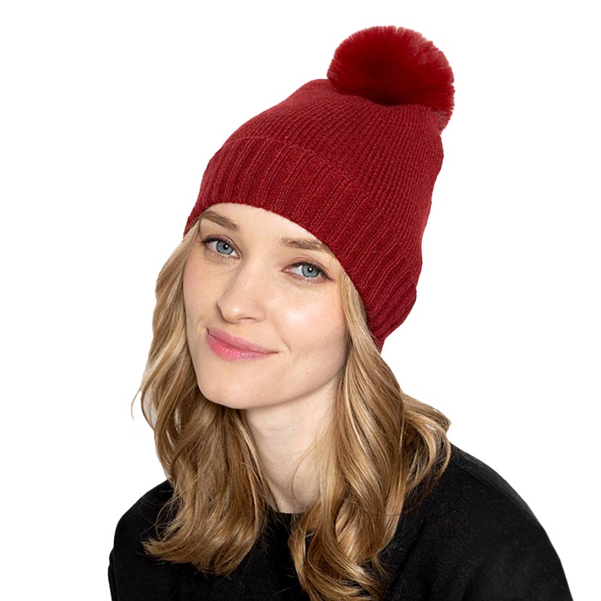 Burgundy Solid Knit Beanie Hat With Faux Fur Pom, accessorize the fun way with this faux fur pom solid knit beanie hat to keep yourself warm and toasty and enrich your beauty with luxe. The autumnal touch you need to finish your outfit in style. Awesome winter gift accessory! Perfect Gift for Birthdays, Christmas, holidays, anniversaries, and Valentine’s Day to your friends, family, and Loved Ones. 