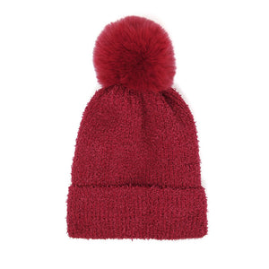 Burgundy Solid Pom Pom Soft Fluffy Beanie Hat. Before running out the door into the cool air, you’ll want to reach for these toasty beanie hats to keep your hands incredibly warm. Accessorize the fun way with these beanie hats, it's the autumnal touch you need to finish your outfit in style. Awesome winter gift accessory!
