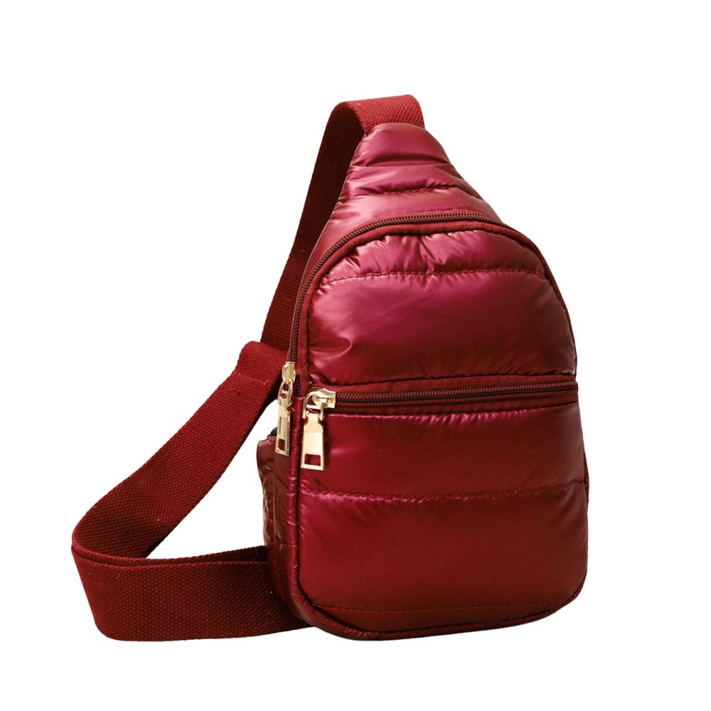 Burgundy Solid Puffer Mini Sling Bag, be the ultimate fashionista while carrying this Solid Puffer Sling bag in style. It's great for carrying small and handy things. Keep your keys handy & ready for opening doors as soon as you arrive. The adjustable lightweight features room to carry what you need for long walks or trips.