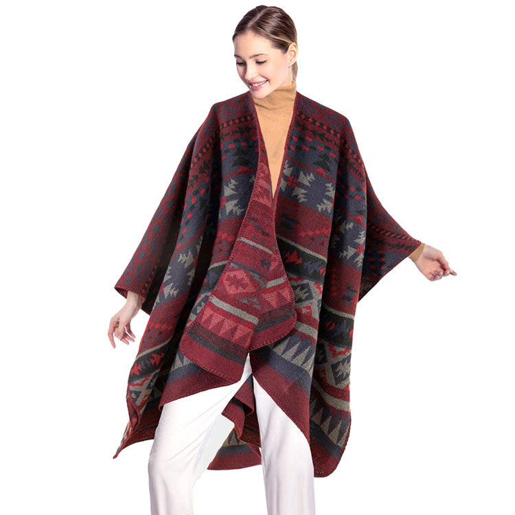 Burgundy Tribal Patterned Poncho, is attractively designed with tribal pattern that will surely amp up your beauty to make you stand out.  It will keep you perfectly warm and toasty everywhere saving you from cold and chill on the outside. It goes with every winter outfit and gives you a unique yet beautiful outlook everywhere. It ensures your upper body keeps perfectly toasty when the temperatures drop.