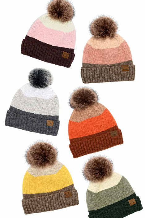 C.C Multi Color Block Stripes Pom Beanie, wear it before running out the door into the cool air to keep yourself warm and toasty and look absolutely beautiful. You’ll want to reach for this toasty beanie to keep you incredibly warm everywhere and every occasion. Accessorize the fun way with this pom hat. It's the autumnal touch you need to finish your outfit in style.