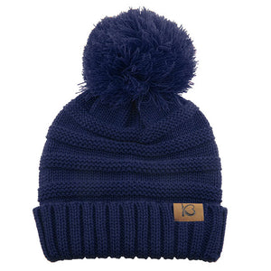 Navy Cable Knit Ribbed Chunk Pom Pom Comfy Winter Beanie Hat. Before running out the door into the cool air, you’ll want to reach for this toasty beanie to keep you incredibly warm. Accessorize the fun way with this pom pom hat, it's the autumnal touch you need to finish your outfit in style. Awesome winter gift accessory!