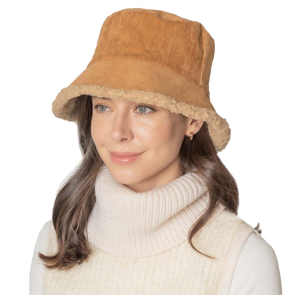 Camel Corduroy Sherpa Bucket Hat, is nicely designed and a great addition to your attire that will amp up your outlook to a greater extent. Before running out the door into the cool air, you’ll want to reach for this toasty beanie to keep you incredibly warm. Accessorize the fun way with this solid knit bucket hat. It's the autumnal touch you need to finish your outfit in style. Awesome winter gift accessory! 