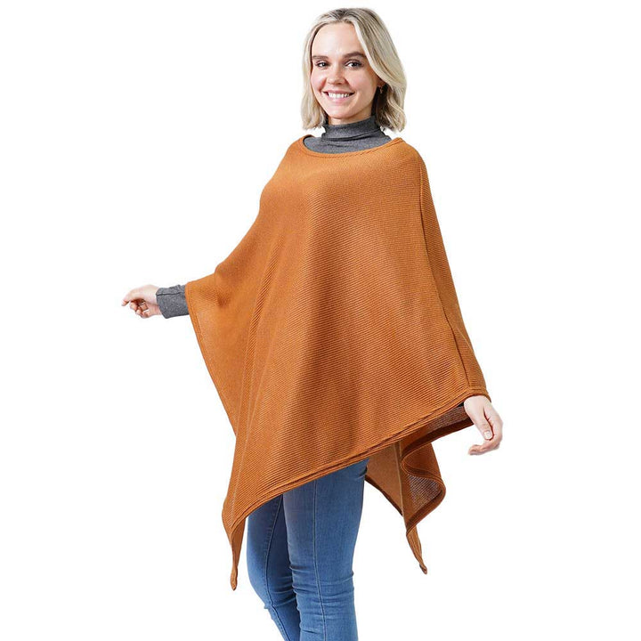 Camel Textured Jersey Poncho, Trendy, classy and sophisticated, Trendy soft natural Textured poncho wrap is perfect for every day wear. Wear it with jeans or evening dress, versatile and stylish. Great travel accessory or everyday use, lightweight, warm and cozy. You can throw it on over so many pieces elevating any casual outfit! Perfect Gift for Wife, Mom, Birthday, Holiday, Christmas, Anniversary, Fun Night Out.