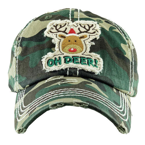 Camo Christmas Cotton OH DEER! Rudolph Vintage Baseball Cap. Fun cool Christmas themed vintage cap. Perfect for walks in sun, great for a bad hair day. The distressed frayed style with faded color gives it an awesome vintage look. Soft textured, embroidered message with fun statement will become your favorite cap.