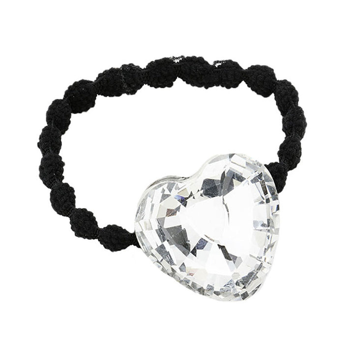 Crystal Heart Accented Stretch Hair Band is a stylish accessory that adds elegance to any hairstyle. The beautiful crystal heart accent complements both casual and formal looks, making it a versatile addition to your hair accessory collection. The stretch design ensures a comfortable fit for all hair types.