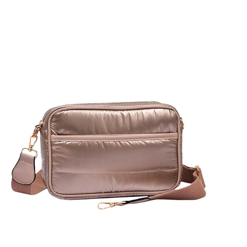 Copper Solid Rectangle Puffer Crossbody Bag, Complete the look of any outfit on all occasions with this Puffer Crossbody Bag. This Puffer bag offers enough room for your essentials. Featuring a one-front slip Pocket, two inside slip Pockets, and a Zipper closure at the top, this bag will be your new go-to! The zipper closure design ensures the safety of your property. These beautiful and trendy Crossbodies have adjustable and detachable hand straps that make your life more comfortable.