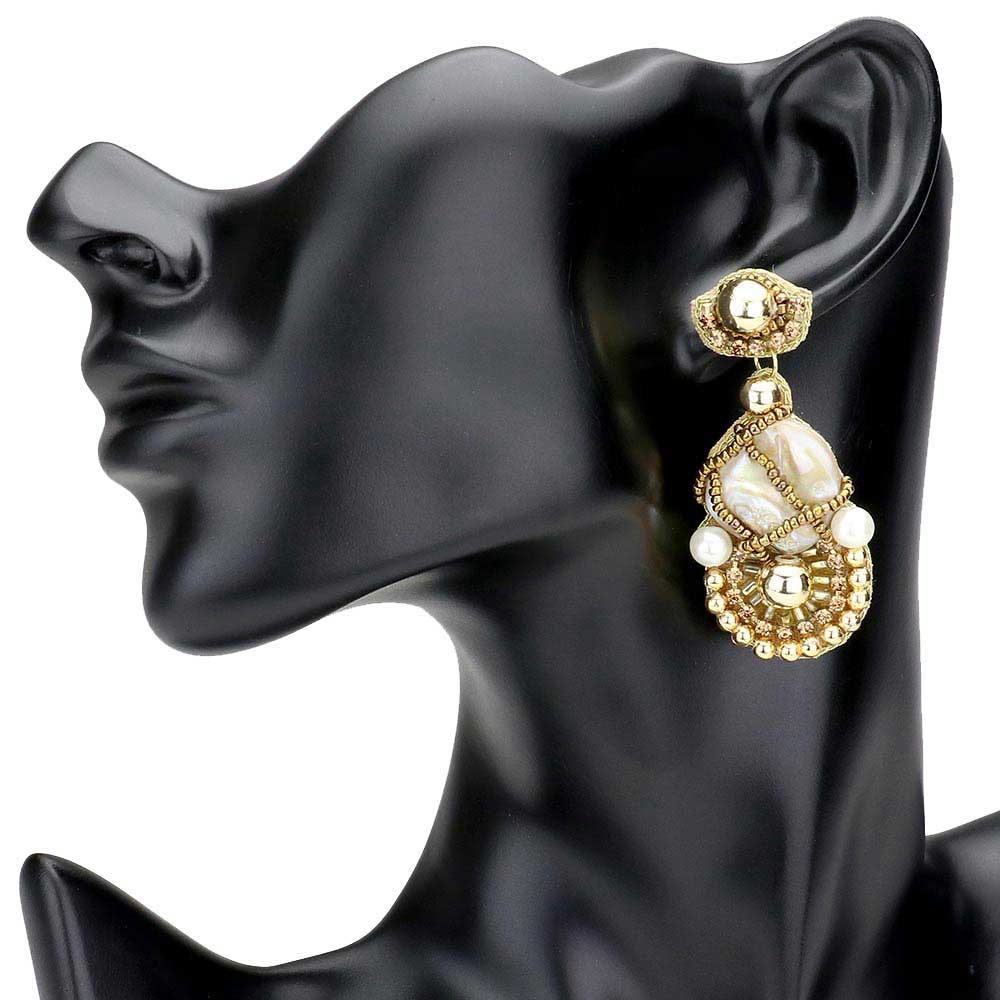 Cream Freshwater Pearl Accented Dangle Earrings. These gorgeous Pearl pieces will show your class in any special occasion. The elegance of these Pearl goes unmatched, great for wearing at a party! Perfect jewelry to enhance your look. Awesome gift for birthday, Anniversary, Valentine’s Day or any special occasion.