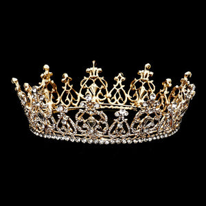 Clear Gold Stone Embellished Crown Tiara. This tiara is a classic royal tiara made from gorgeous stone is the epitome of elegance, luxury and grace. Unique Hair Jewelry is suitable for any special occasions such as wedding, engagement, prom, evening etc. It's the most exquisite gift for the bride to be. It's the perfect complement will make your whole wedding dress look come to alive.