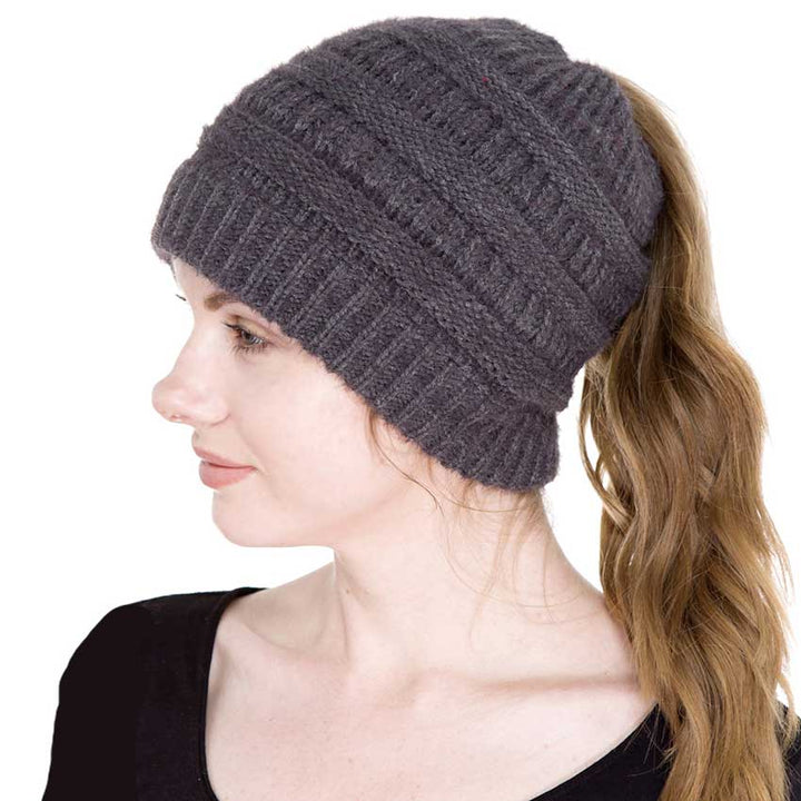 Dark Gray Cable Knit Ponytail Beanie Hat, Perfect for pulling your messy bun or high ponytail, while keeping ears warm. Great to wear while exercising in cold weather to keep your hair up and your head warm. It's the autumnal touch you need to finish your outfit in style. The cable knit hat can be used on your working day, You can also wear it in outdoor sports: running, biking etc. Awesome winter gift accessory!