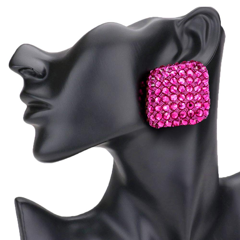 Fuchsia Stone Embellished Rhombus Earrings, elegance becomes you in these shiny glamorous stone embellished earrings. The perfect sparkling accessory to add sophisticated luxe and a touch of perfect class to your next social event. Coordinate these rhombus earrings with any ensemble from business casual wear. Coordinate every outfit with beauty and gorgeousness. Stay classy!