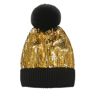 Gold Sequin Embellished Pom Pom Beanie Hat. Before running out the door into the cool air, you’ll want to reach for these toasty beanie to keep your hands incredibly warm. Accessorize the fun way with these beanie , it's the autumnal touch you need to finish your outfit in style. Awesome winter gift accessory!