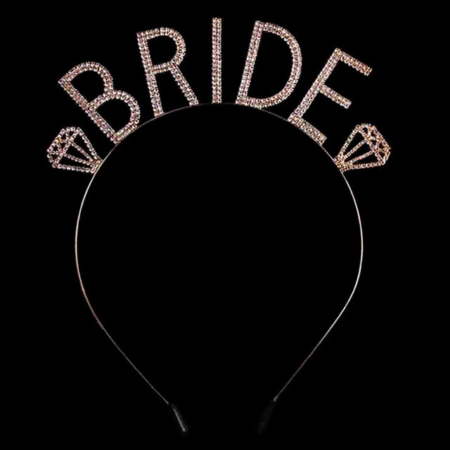 Gold Bride Rhinestone Headband. A timeless selection, Bridal Rhinestone Headband is exceptionally elegant, adding an exquisite detail to your wedding dress or tie it on your hair for a glamorous to any outfit. This headband will pair beautifully with your dress for elegant presentation. Perfect for brides, bridal parties, and any other formal occasion.