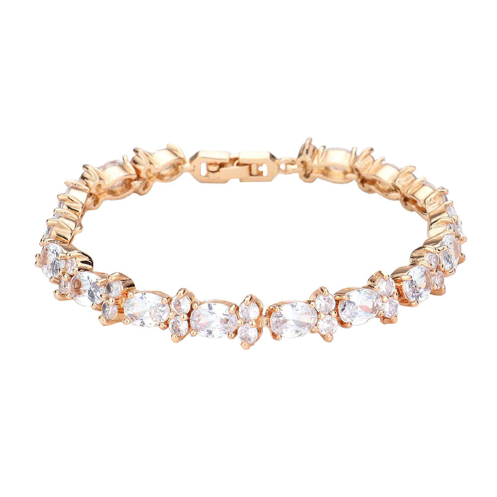 Gold CZ Round Oval Cluster Evening Bracelet. With its elegant design, this bracelet adds a feminine accent to any style. Pair it with your casual or formal attire. Get ready with these bright stunning fashion bracelets, put on a pop of shine to complete your ensemble. These CZ cluster bracelets are perfect for Party, Wedding and Evening.