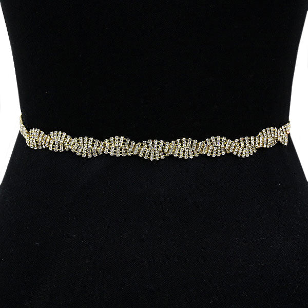 Gold Clear Rhinestone Twist Organza Fabric Belt, is an awesome rhinestone twist-designed Belt that surely amps up your beauty & adds extra luxe to your outlook on special occasions. Wear this Fabric Belt at a wedding or bridal confidently to show your elegance & perfect class and make you stand out from the crowd.