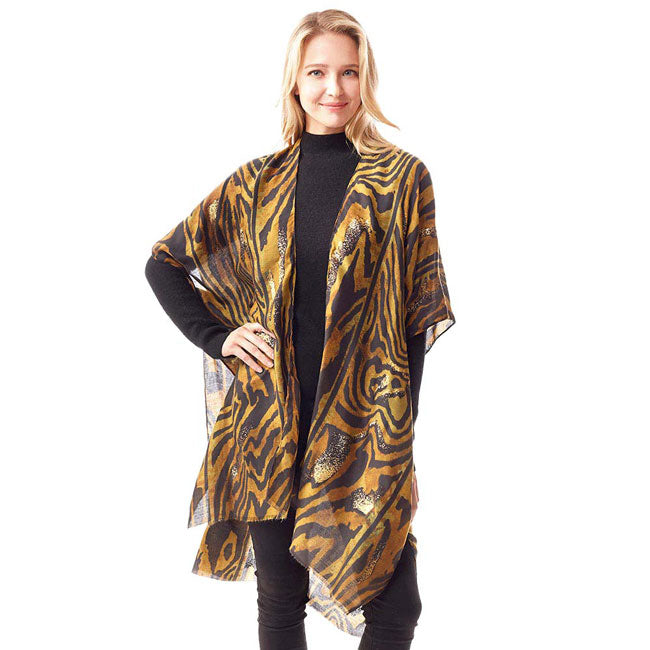 Brown Mixed Animal Printed Gold Foil Accented Ruana Poncho, on-trend & fabulous design make it eye-catching and beautiful. It will keep you cozy and comfortable on winter and cold days. Go outside with confidence and beauty with this animal-designed ponchos. It's a luxe addition to any cold-weather ensemble. Great for daily wear in the cold winter to protect you against the chill.
