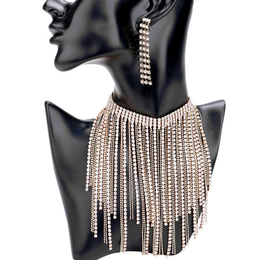 Gold Rhinestone Fringe Bib Choker Necklace. This magnificent wide bib choker will show a unique and gorgeous look with its open wide design. Give it to the loved one, or treat yourself for a trendy necklace style. You'll look and feel great with this fashion collar! Pair this choker with any ensemble for a polished look, adds a gorgeous stylish glow to any outfit style, jewelry that fits your lifestyle! Fabulous gift, ideal for your loved one or yourself.
