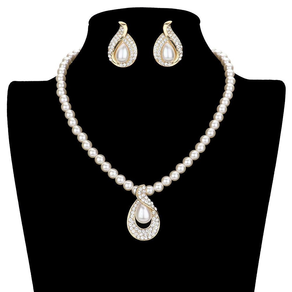 Gold Rhinestone Pave Teardrop Pearl Beaded Collar Necklace. This magnificent pearl themed will show a unique and gorgeous look with its open wide design. Give it to the loved one, or treat yourself for a trendy necklace style. You'll look and feel great with this fashion collar! Pair this jewelry with any ensemble for a polished look, adds a gorgeous stylish glow to any outfit style, jewelry that fits your lifestyle! Fabulous gift, ideal for your loved one or yourself.