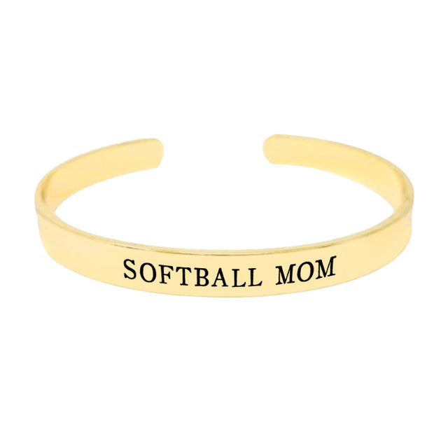 Gold Softball Mom Gold Dipped Metal Cuff Bracelet, These Metal Cuff bracelets are easy to put on, take off and so comfortable for daily wear. Best loving gift to express your love to your mother on Mother's Day. Shows the love between mother and child is forever. This Mom bracelet is the ideal Mother's Day present for all the unique ladies in your life, as well as those who have been inspired by sports moms.
