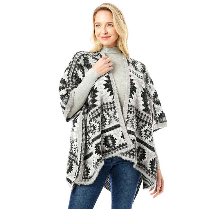 Gray Aztec Pattern Ruana, is perfect wear to keep you warm and toasty on winter and cold days. Its beautiful color variation goes with every outfit and surely makes you stand out from the crowd. It ensures your upper body keeps perfectly toasty when the temperatures drop. It's the timelessly beautiful poncho that feels exceptionally comfortable to wear. It goes with all your winter outfits to give you a unique yet classy outlook. You can throw it on over so many pieces elevating any casual outfit!