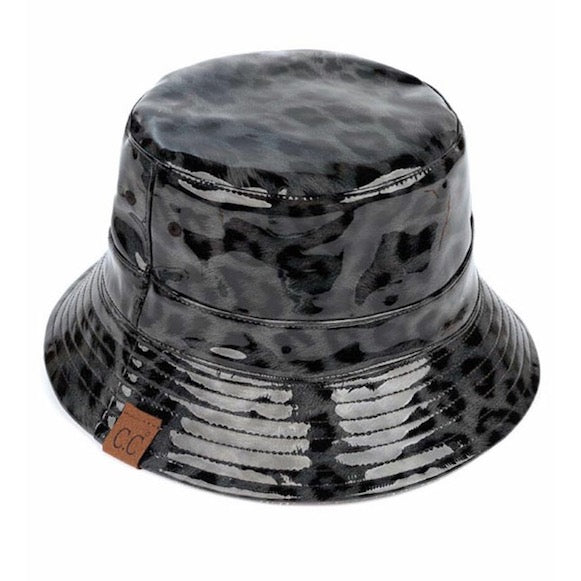 Gray C.C Leopard Patterned Shiny Animal Printed Reversible Rain Bucket Hat; this rain hat is snug on the head and works well to keep rain off the head, out of the eyes, and also the back of neck. Wear it to lend a modern liveliness above a raincoat on trans-seasonal days in the city. Perfect Gift for fashion-forward friend